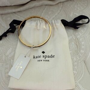Kate Spade Gold-Tone Bangle with Pouch